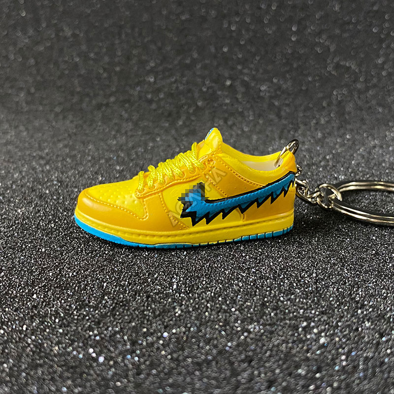 yellow nike keychain